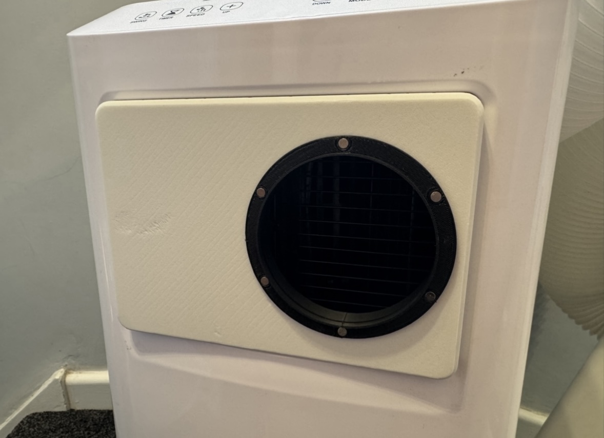 3D printed replacement air conditioner faceplate, front view, second angle