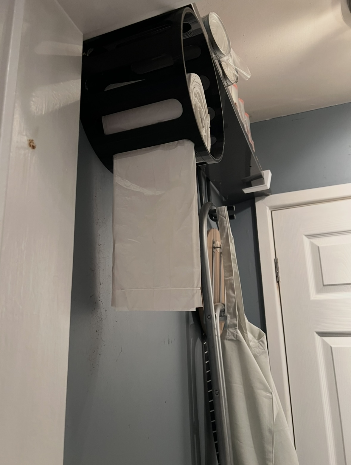 3D printed wall mount for a roll of bin bags