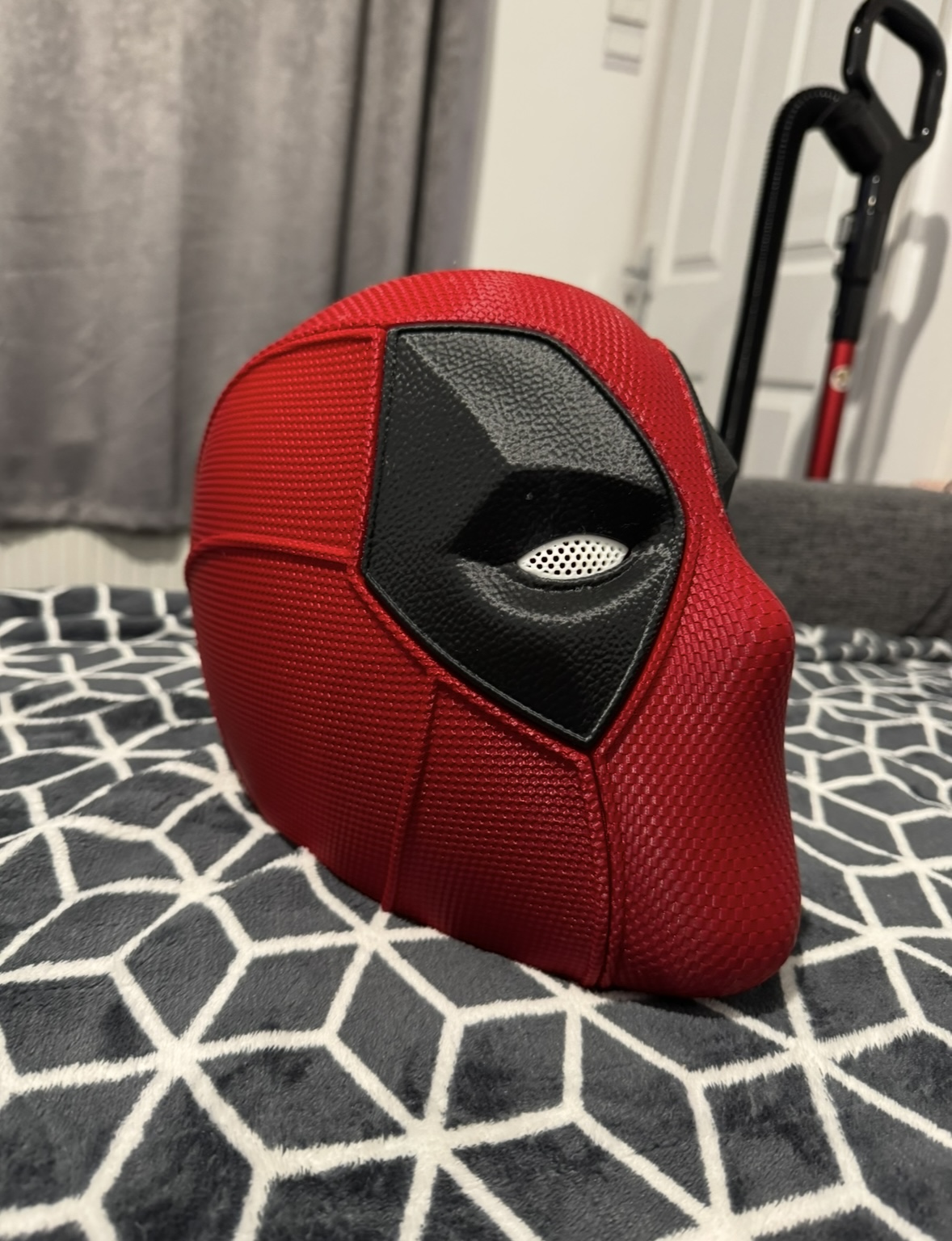 Medium red 3D printed helmet, side view
