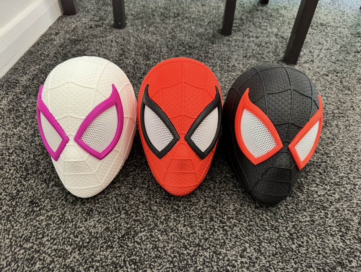 Small 3D printed helmet with a web design, main view
